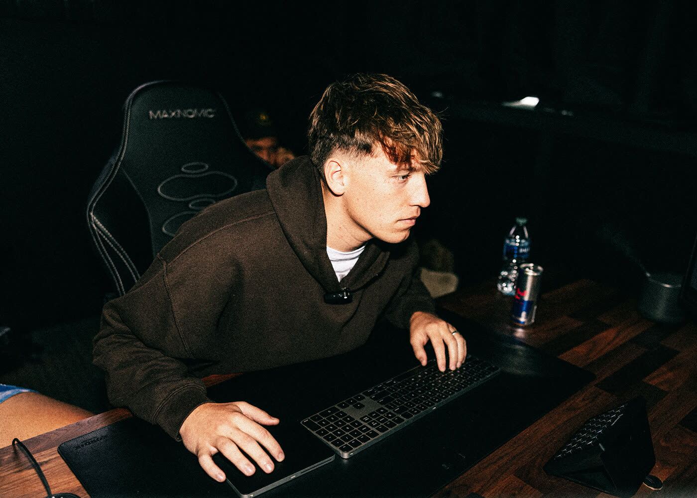 Jude Barclay working on a song at his computer